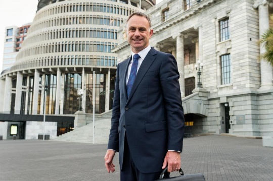 The Honourable Simon Watts, Minister of Revenue, standing outside Parliament in Wellington.